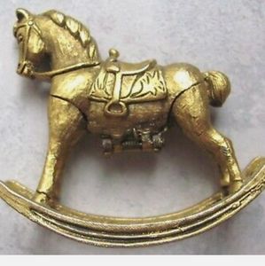 Max factor golden rocking horse with hidden solid perfume
